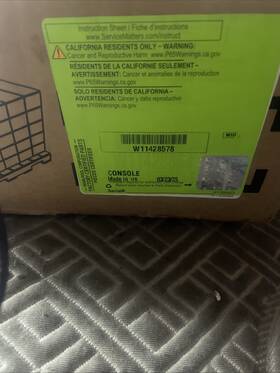W11428578 Whirlpool Range Console