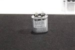 Nob Cde 32FD3703A-F Film Capacitor SFA37T3K219B-F Vac .sku 223562. Fixed Price $18.18.