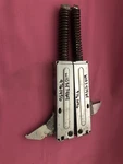 9761496 - W10347464 Whirlpool Range Door Hinge (used). Fixed Price $25.00.