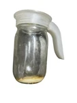 See Pics - Jenn Air Grease Jar Drain Handle Top WPY707869, 71002170 B20. Fixed Price $29.95.