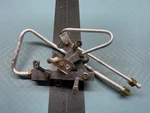 Range Surface Burner Igniter Orifice Holder P# WB28K10785. Fixed Price $66.45.