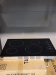 Frigidaire Electric Cooktop FFEC3025UB Black Glass 4 Element Open Box. Fixed Price $425.00.