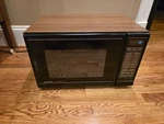 Vintage Sharp Carousel Microwave Oven Model R-4A70 1988 Faux Wood Grain Clean. Fixed Price $279.99.