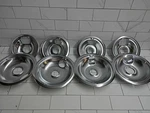 2PK Of Cozzivita 4 Piece Drip Pan Set. Fixed Price $19.99.
