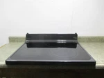 Range Cooktop Cloudy Burners/chips/scratches Part # WB62X26710. Fixed Price $709.00.
