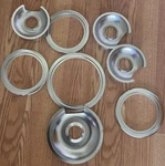 WB32X10013 WB32X10012 Chrome Stove Burner Drip Pan Set 4-PACK. Fixed Price $24.99.
