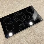 Ge Oem Electric Cooktop Black Glass WB62X43035 36" 20-3/8". Fixed Price $399.95.