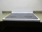 Range Cooktop Chips/scratches/cloudy Part # WB62T10273. Fixed Price $210.00.