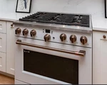Caf - Handle & Knob Set For 36" Pro Rangetop Brushed Copper. Fixed Price $419.00.