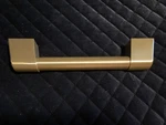 (1) Cafe Brushed Brass Smaller Handle For 48 Pro Rangetop. Fixed Price $175.00.