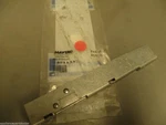 New Whirlpool Range Door Hinge Bracket WP74011337. Fixed Price $31.99.