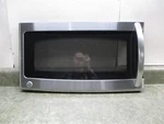 Ge Microwave Door Scratches/chipped Part # WB56X10717. Fixed Price $81.00.