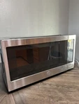 Profile 2.2CU. Ft Countertop Microwave PES7227SL5SS *damaged *read. Fixed Price $194.99.
