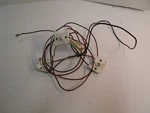 Maytag Range Igniter Switch Dark Brown Part #7403P190-60. Fixed Price $28.00.