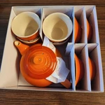 Le Creuset Teapot Flame Orange 600ML Stoneware Cups Saucers Of 4. Fixed Price $129.00.