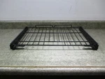 Range Glide Rack Rust Part # WB48X21764. Fixed Price $160.75.