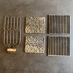 Jenn Air Grill Set 04100024-28 Dual Coil Element Grates Lava Rock Plates 800061. Fixed Price $100.00.